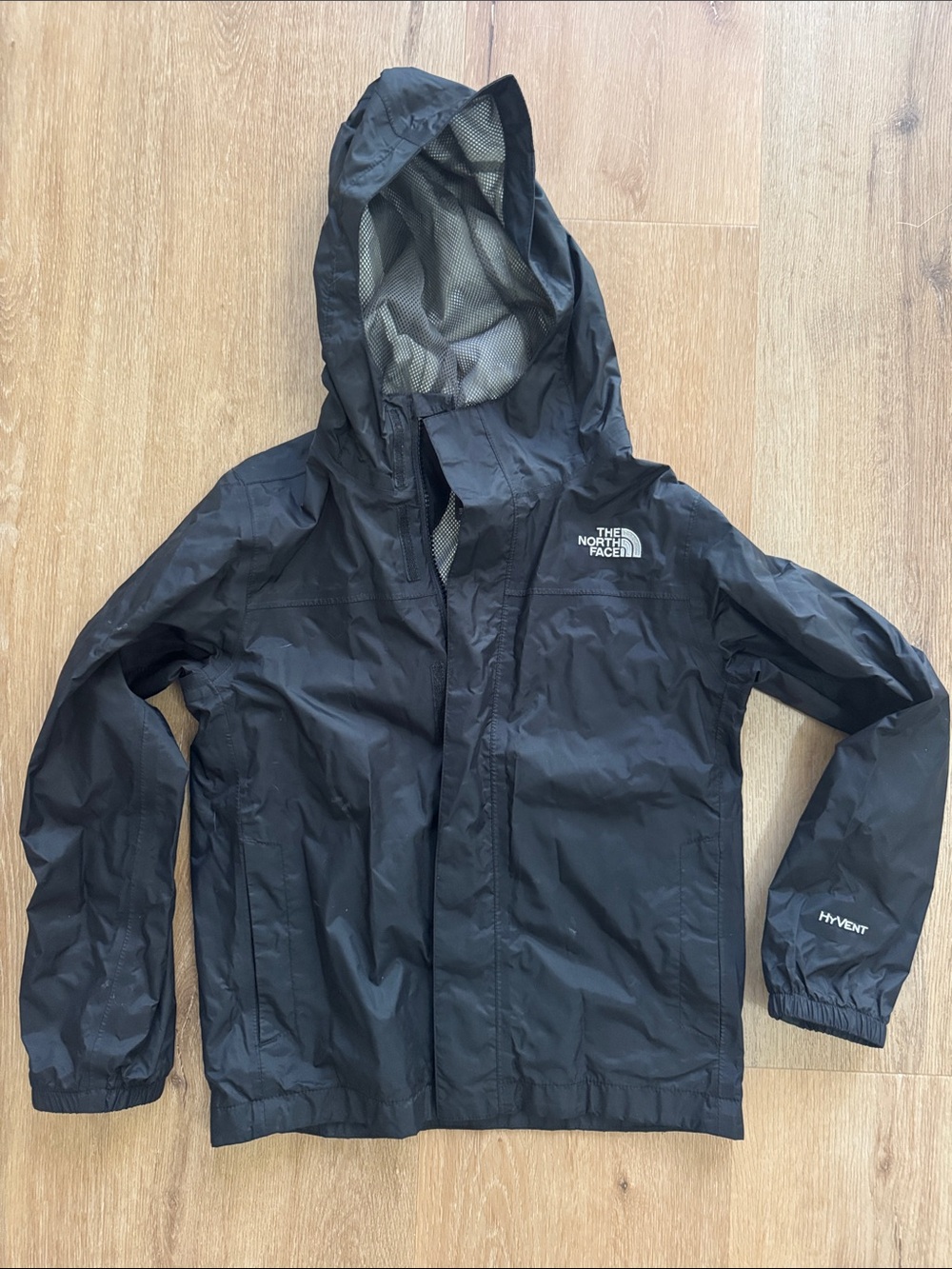 North Face youth small (7/8) black rain coat with hood
